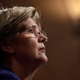Sen. Elizabeth Warren (D-MA) listens as Consumer Financial Protection Bureau Director Richard Cordray testifies before the Senate Banking, Housing and Urban Affairs Committee November 12, 2013 in Washington, DC.